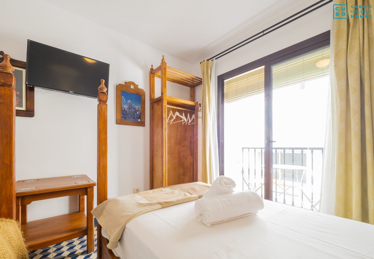 Rent by room in Tolox - Cubo's Hostal La Plaza Room 102 with Breakfast