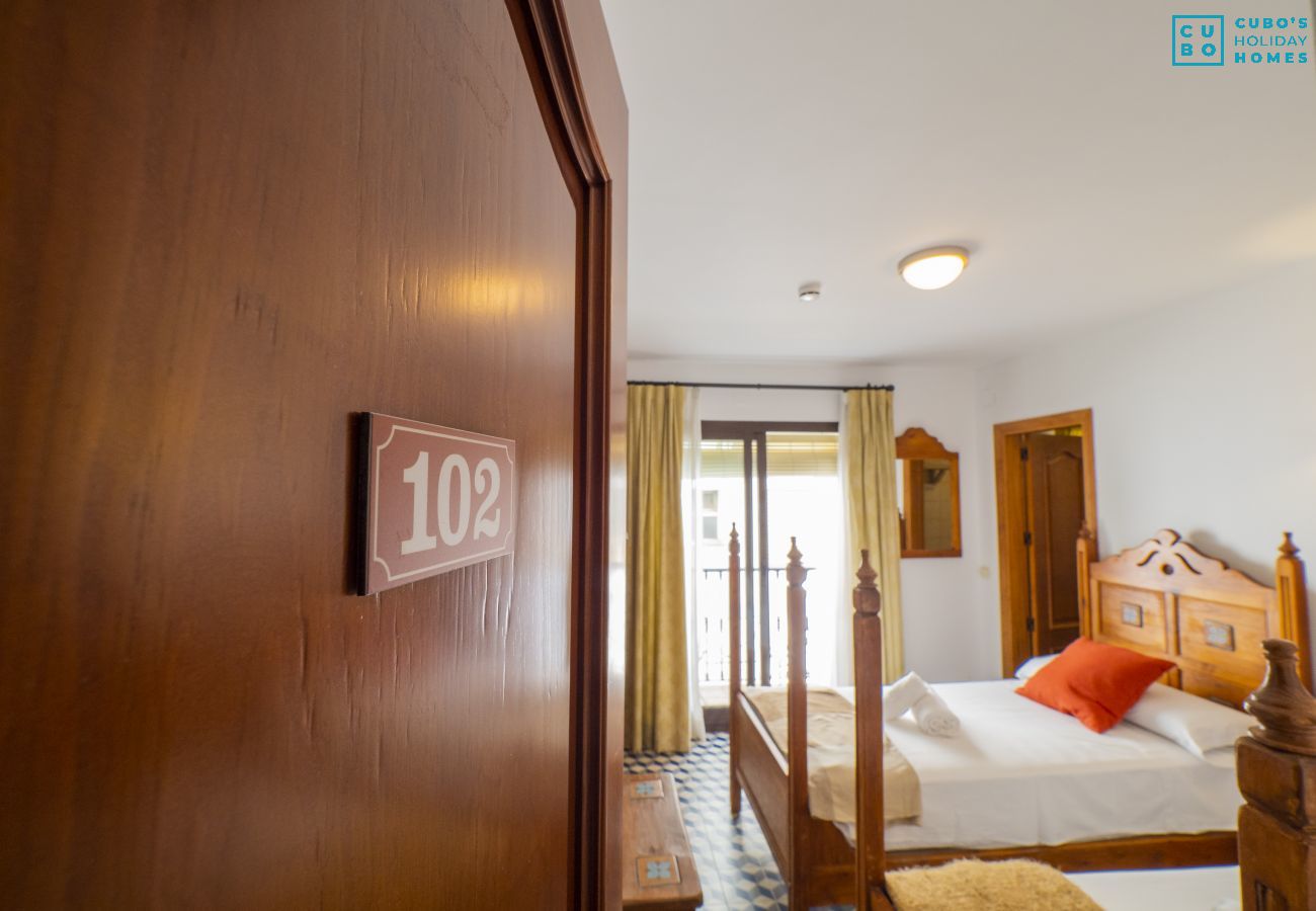 Rent by room in Tolox - Cubo's Hostal La Plaza Room 102 with Breakfast