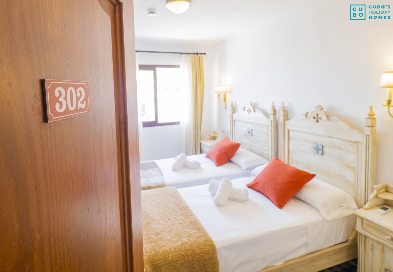 Rent by room in Tolox - Cubo's Hostal La Plaza Room 302 with Breakfast